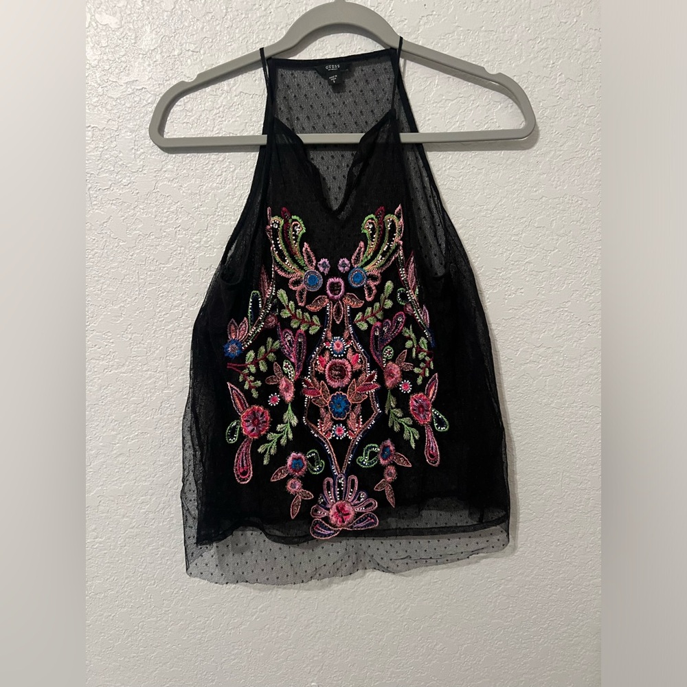 guess. size small. color is back but its a mesh see through type shirt